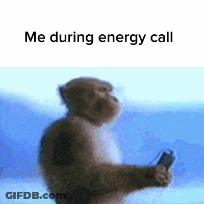 A Monkey Is Holding A Cell Phone With The Words Me During Energy Call Below It . GIF