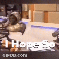 A Monkey Is Sitting In Front Of A Microphone With The Words I Hope So Written On The Screen GIF