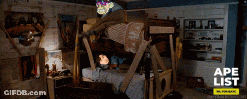 A Monkey Laying On Top Of A Bunk Bed With The Words Ape List On The Bottom Right GIF