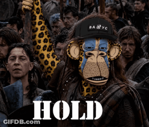 A Monkey Wearing A Ba Yc Hat Stands In A Crowd Of People GIF