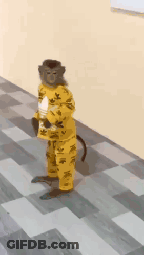 A Monkey Wearing A Yellow Adidas Outfit Is Standing On A Checkered Floor GIF