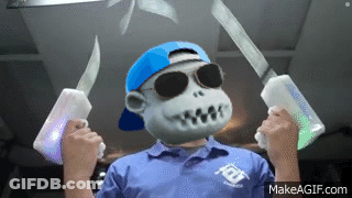 A Monkey Wearing Sunglasses And A Blue Hat Is Holding Two Knives .. GIF