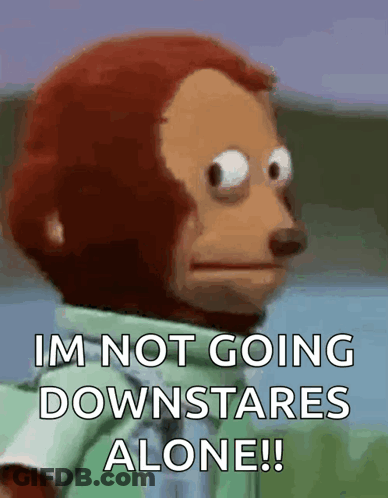 A Monkey With A Green Shirt Says Im Not Going Downstairs Alone GIF