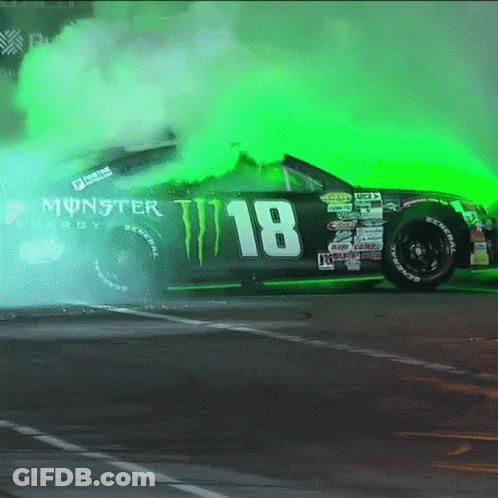 A Monster Energy Car With The Number 18 On The Side GIF