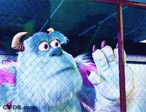 A Monster From The Movie Monsters Inc Is Behind A Fence GIF