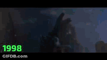 A Monster Is Being Attacked By A Lightning Bolt In A Dark Room . GIF