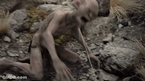 A Monster Is Crawling On The Ground With A Rope Coming Out Of His Mouth GIF
