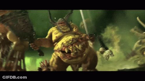 A Monster With Horns Is Holding A Sword GIF