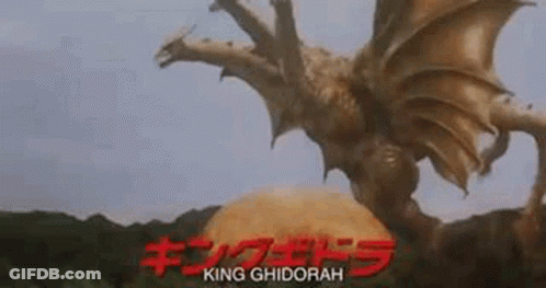 A Monster With Wings Is Standing On Top Of A Pile Of Food . GIF