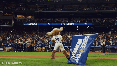 A Moose Mascot Is Holding A Blue Seize The Moment Flag GIF