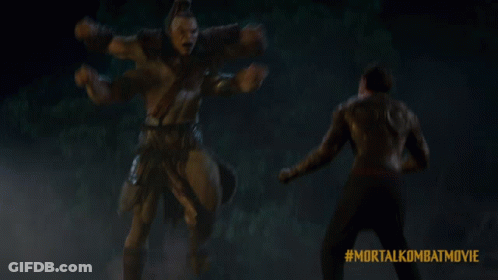 A Mortal Kombat Movie Advertisement With Two Men Fighting GIF