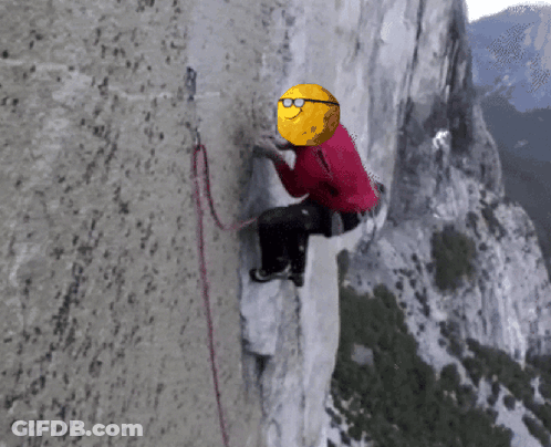 A Mountain Climber With A Yellow Ball On His Head GIF