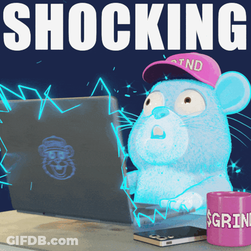 A Mouse With A Hat That Says Tnd On It Is Sitting In Front Of A Laptop GIF