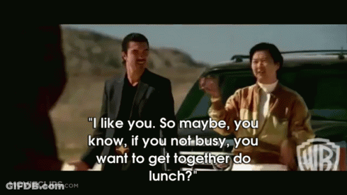 A Movie Clip From Movieclips.com Shows Two Men Standing Next To Each Other In Front Of A Car GIF