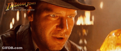 A Movie Poster For Indiana Jones And The Temple Of Doom Shows A Man In A Hat GIF