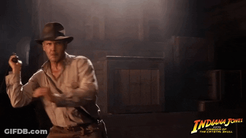 A Movie Poster For Indiana Jones Shows A Man In A Hat Holding A Gun GIF