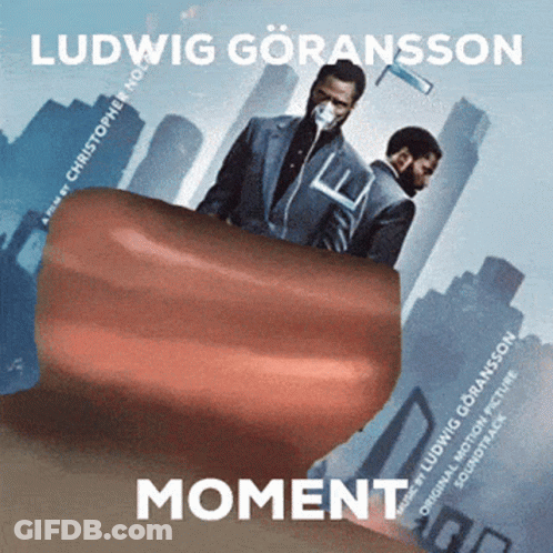 A Movie Poster For Moment Shows Two Men In Suits GIF