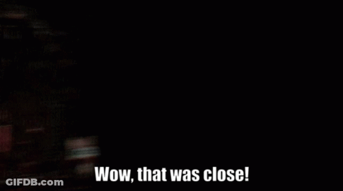 A Movie Theater With The Words Wow That Was Close On The Bottom GIF