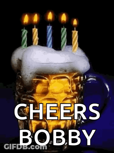 A Mug Of Beer With Candles On Top Of It And The Words Cheers Bobby GIF