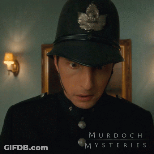 A Murdoch Mysteries Poster With A Police Officer GIF