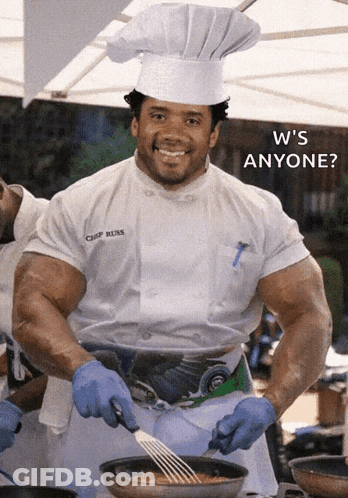 A Muscular Chef With The Name Chef Rusk On His Shirt GIF