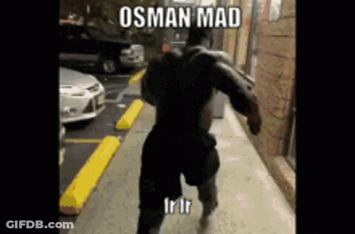 A Muscular Man Is Running Down A Sidewalk With A Caption That Says ' Osman Mad ' GIF