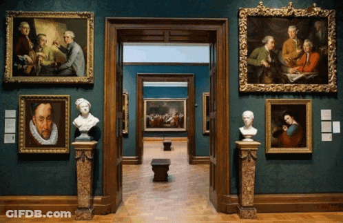 A Museum With A Lot Of Paintings And Busts GIF