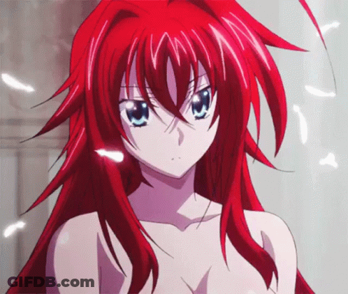 A Naked Anime Girl With Red Hair And Blue Eyes Looks At The Camera GIF