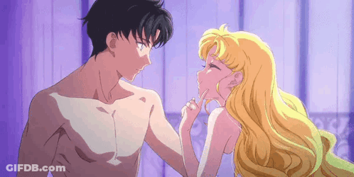 A Naked Man And A Naked Woman Are Standing Next To Each Other . GIF