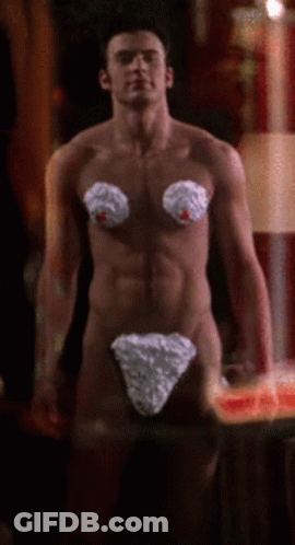 A Naked Man With Whipped Cream On His Breasts GIF