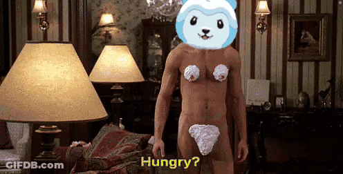 A Naked Man With Whipped Cream On His Chest Is Standing In A Living Room And Says Hungry . GIF