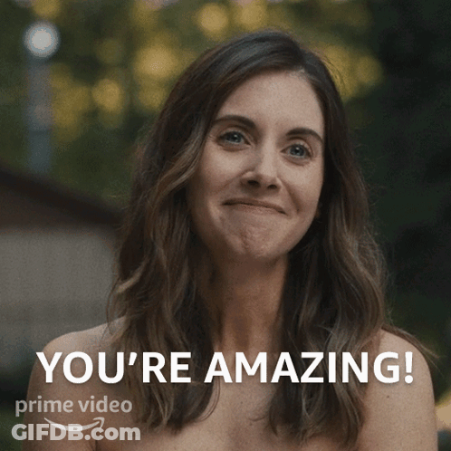 A Naked Woman Is Smiling With The Words You 'Re Amazing On The Bottom GIF
