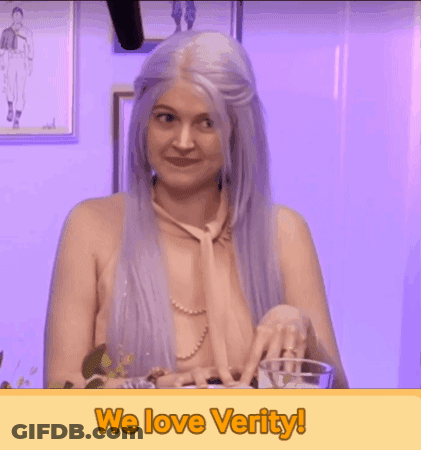 A Naked Woman With Purple Hair Is Holding A Glass With The Words We Love Verity Below Her GIF
