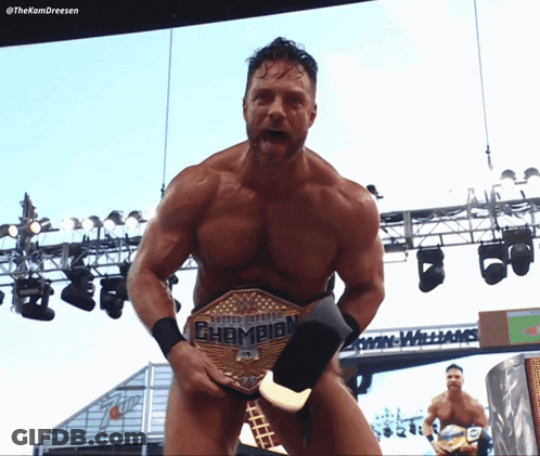 A Naked Wrestler Holding A United States Champion Belt GIF