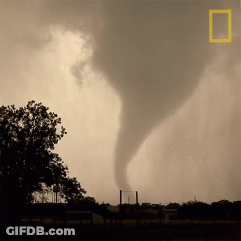A National Geographic Photo Of A Tornado In A Field GIF