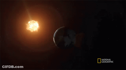 A National Geographic Poster Shows The Earth And Sun GIF