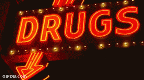 A Neon Sign For Drugs With An Arrow Pointing To The Right GIF