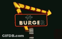 A Neon Sign For In-N-Out Burger Is Lit Up GIF