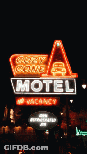 A Neon Sign For The Cozy Cone Motel Says No Vacancy GIF