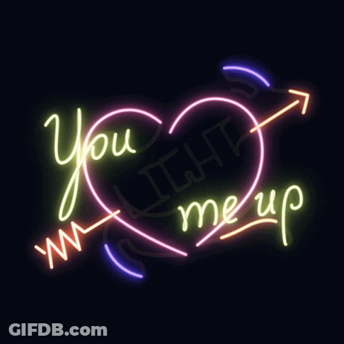 A Neon Sign Says You Light Me Up GIF