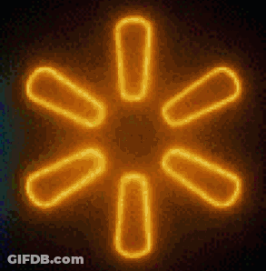 A Neon Sign That Looks Like A Star With A Dark Background GIF