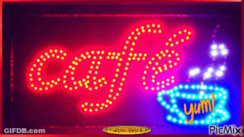 A Neon Sign That Says Cafe And A Cup Of Coffee GIF