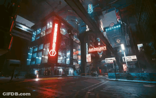 A Neon Sign That Says Kabayan On It In A City GIF