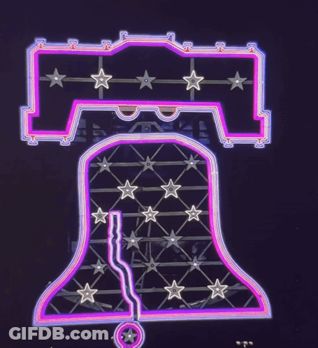 A Neon Sign That Says Liberty Bell With Stars On It GIF