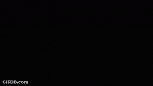 A Neon Sign That Says Rt San Antonio After Dark In Front Of A Group Of People GIF