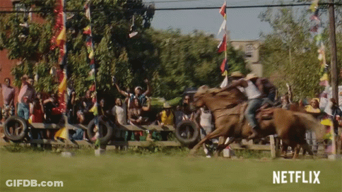 A Netflix Ad Shows A Cowboy Riding A Horse In A Field GIF