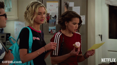 Girl Holding Pink Cupcake Netflix Ad GIF