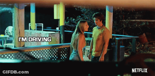 A Netflix Ad Shows A Man And A Woman Standing On A Porch GIF