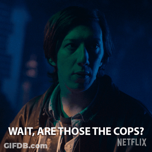 A Netflix Ad Shows A Man In A Dark Room With The Caption Wait Are Those The Cops GIF