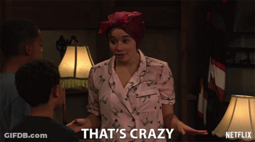 A Netflix Ad Shows A Woman In Pajamas Talking To Two Boys GIF